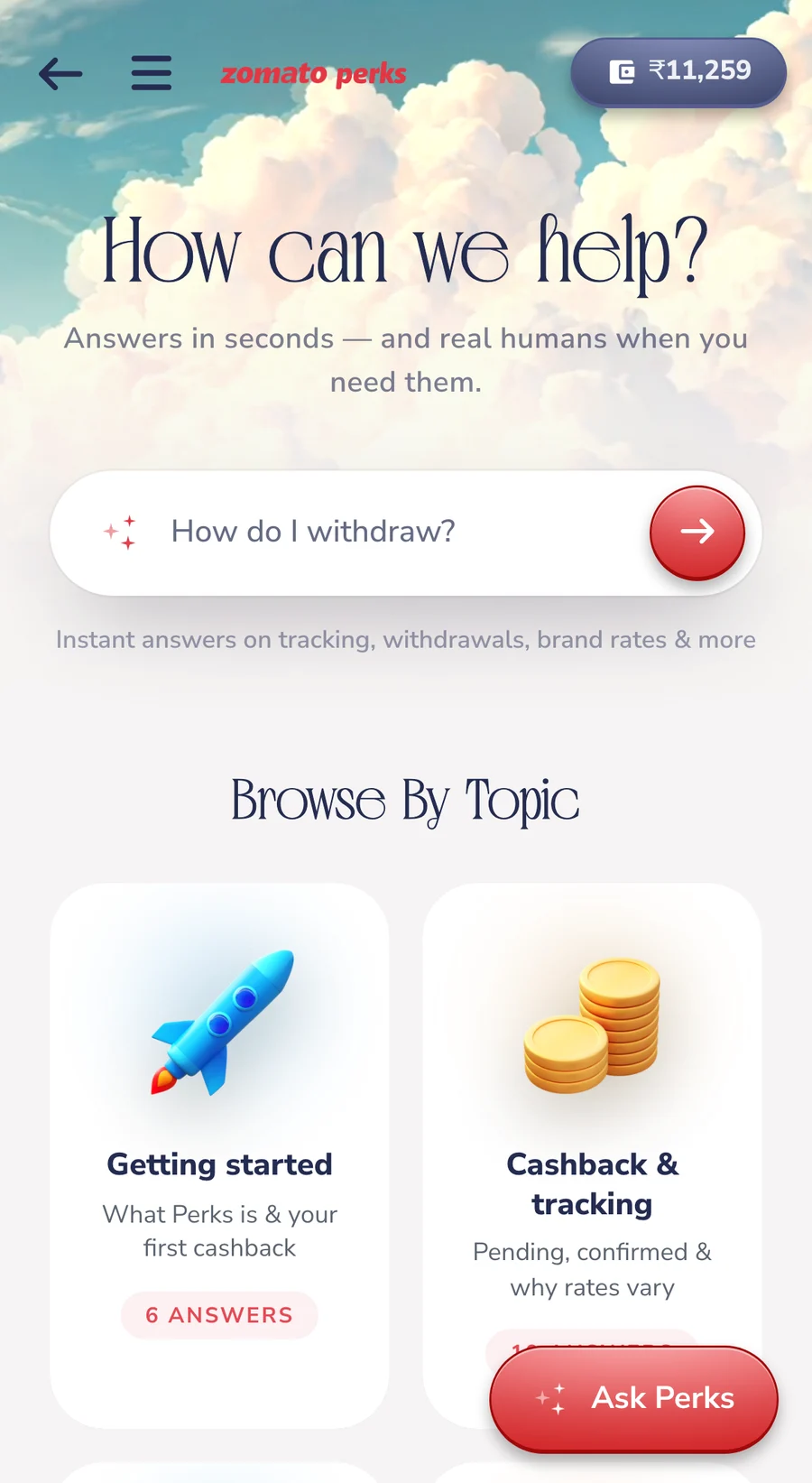 Help centre on a phone: an ask pill and topic tiles